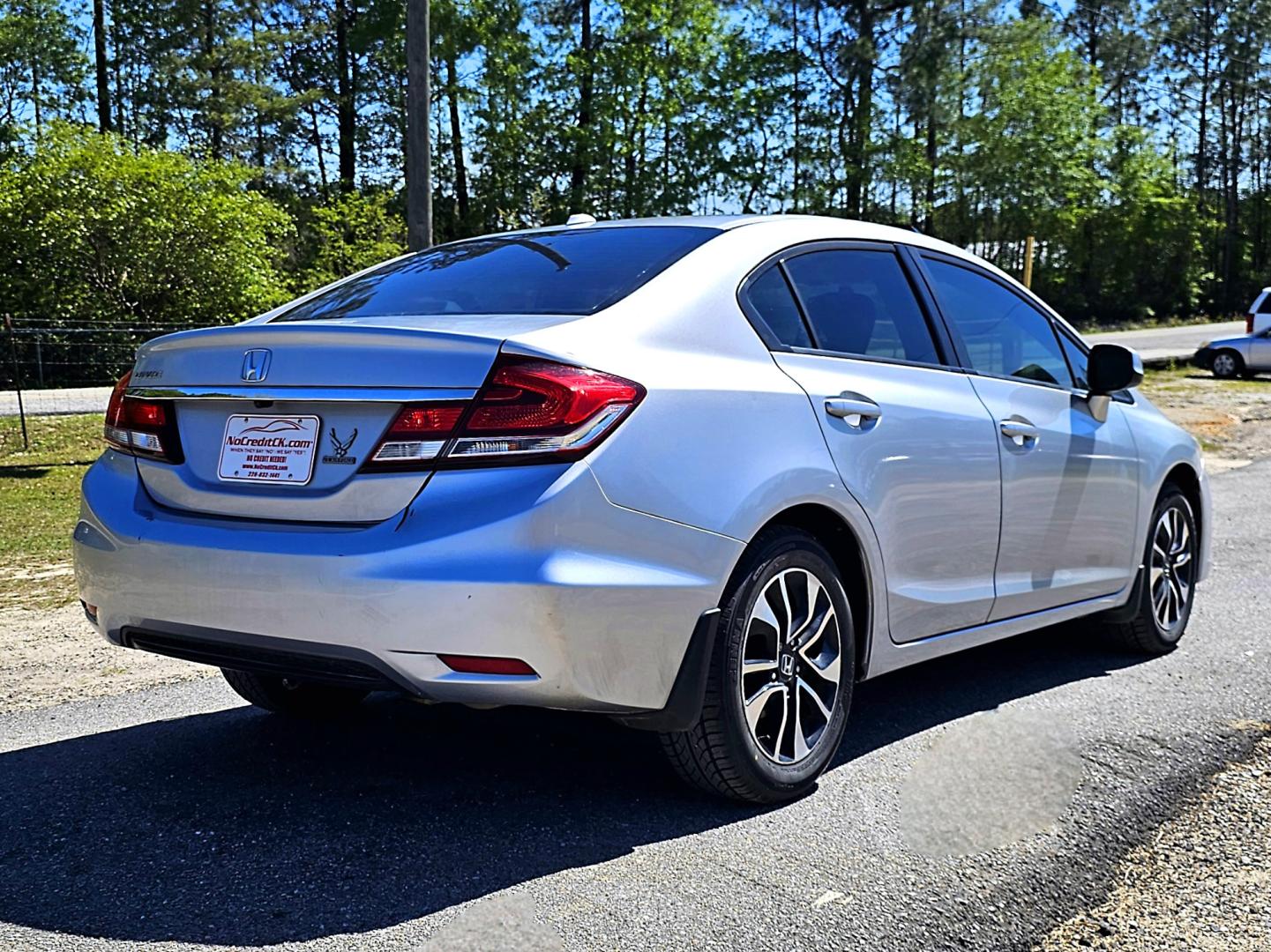 2013 Silver Honda Civic EX-L Sedan 5-Speed AT (2HGFB2F94DH) with an 1.8L L4 SOHC 16V engine, 5-Speed Automatic transmission, located at 18001 Kellogg Rd, Saucier, MS, 39574, (228) 832-1441, 139.421463, -76.641457 - Photo#5